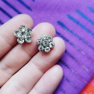 Two sets of stud earrings